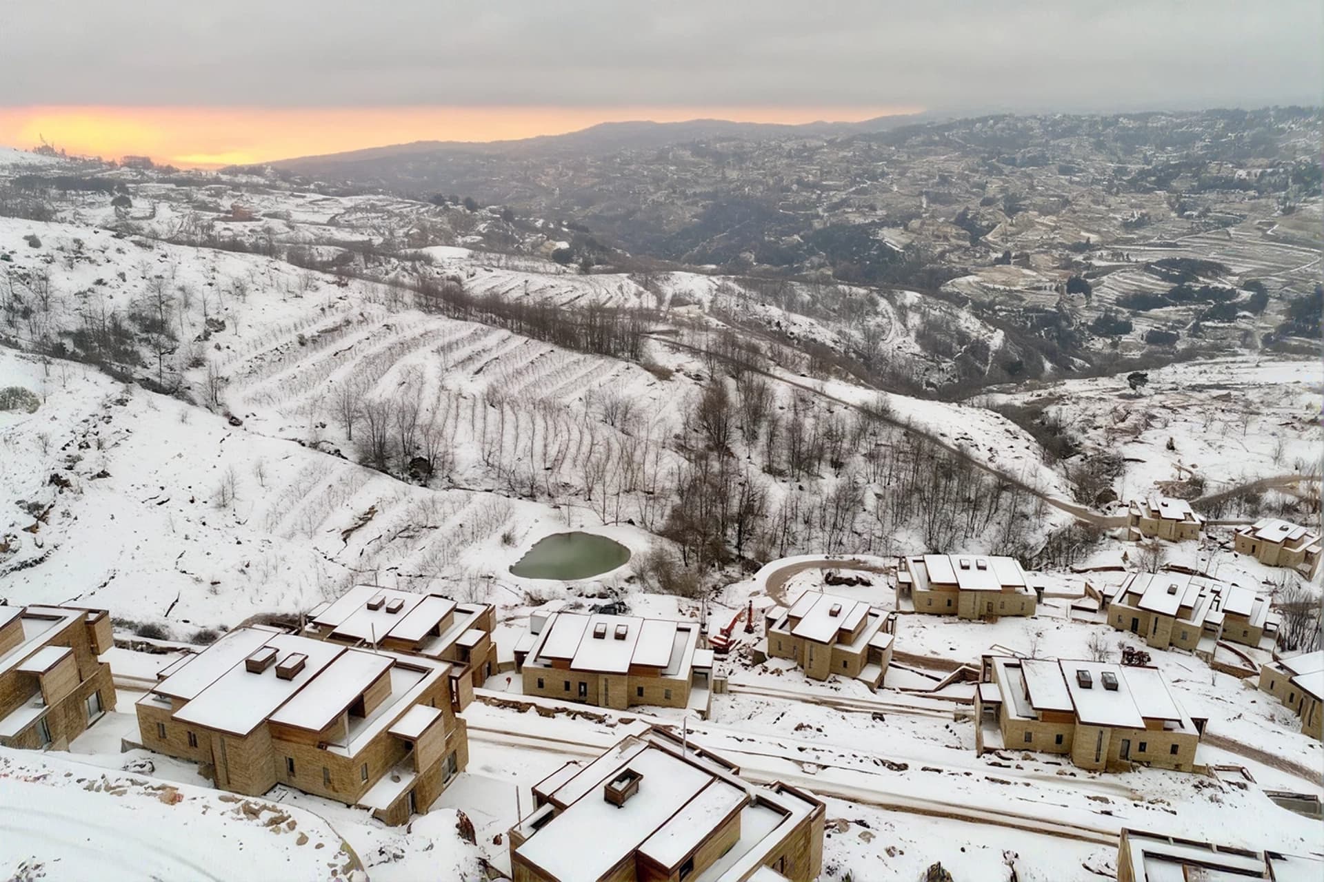 RedRock chalets under snow above Faqra